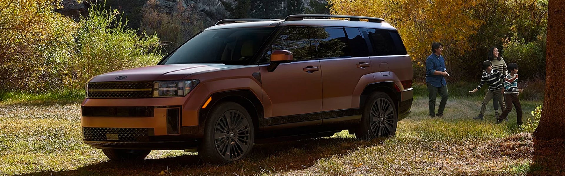 2026 Hyundai Santa Fe XRT SUV parked in wooded outdoor setting