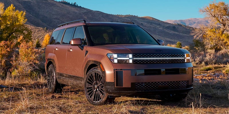 2026 Hyundai Santa Fe XRT SUV parked in mountain landscape