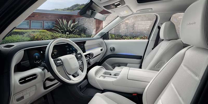 Hyundai Palisade interior with premium seating, dashboard, and spacious cabin design.